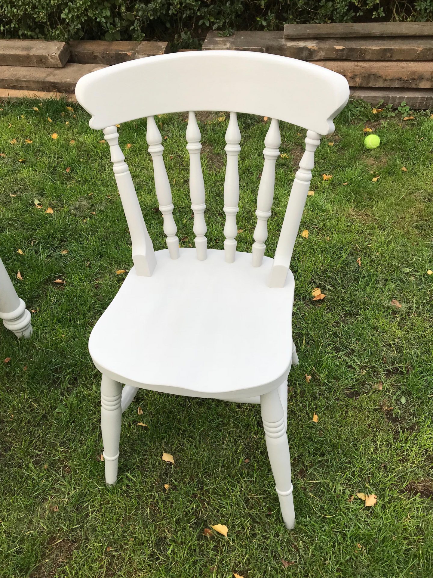 Restored dining room chair sanded and painted in white