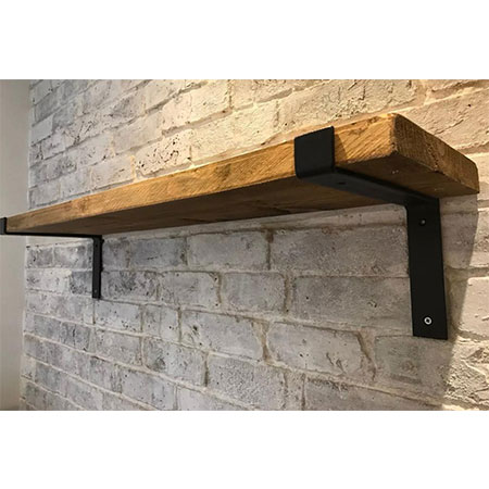 Reclaimed wood shelving with metal fixtures